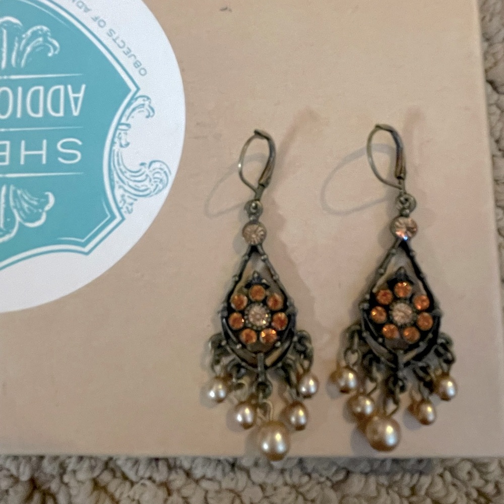 Orange/bronze dangling earrings